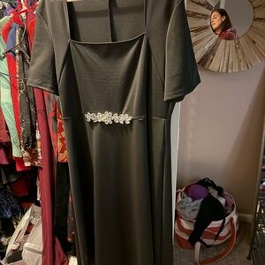 Elegant Black Dress with Embellished Waist